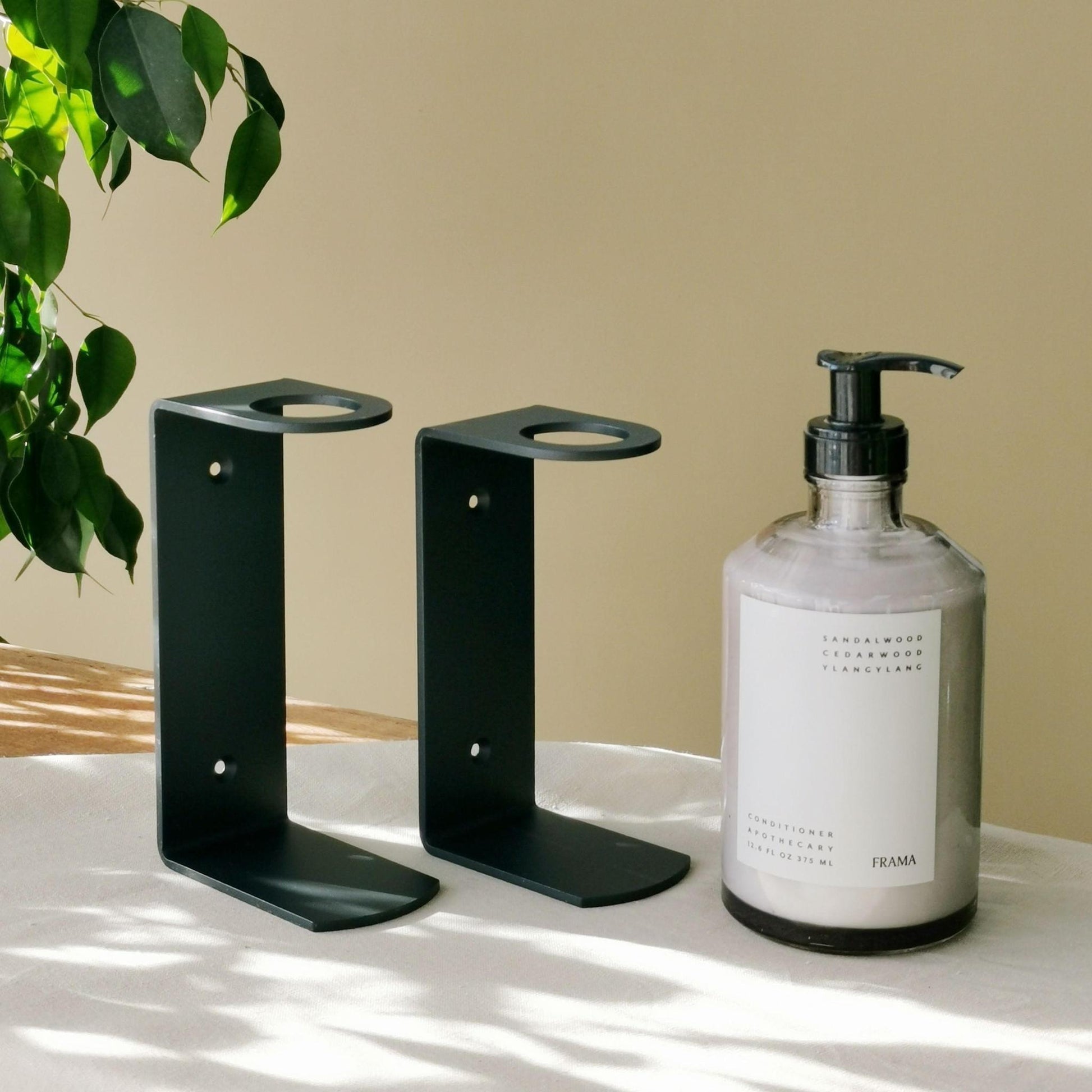 FRAMA Apothecary Wall Display Matte Black Steel  for  500ml bottles - THE PLANT SOCIETY